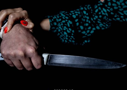 Coratda qadın öldürülüb, oğlu isə xasarət alıb